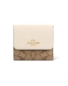 กระเป๋าสตางค์ผู้หญิง COACH CE930 SMALL TRIFOLD WALLET IN BLOCKED SIGNATURE CANVAS (IMV1X)