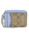 กระเป๋าใส่บัตร COACH C0058 ZIP CARD CASE IN SIGNATURE CANVAS (SVTV2)