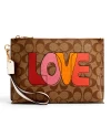 COACH C2890 ROWAN POUCH IN SIGNATURE CANVAS WITH LOVE PRINT (IMLOT)