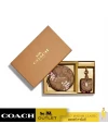 กระเป๋าใส่บัตร COACH C7357 BOXED TECH ORGANIZER AND WIRELESS EARBUD BAG CHARM SET IN SIGNATURE CANVAS WITH EVERGREEN FLORAL PRINT (IME7V)