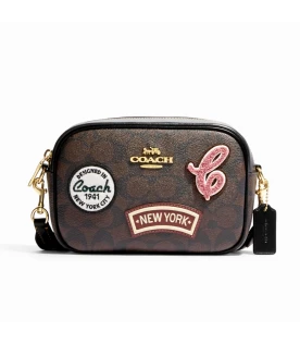 กระเป๋าสะพายข้าง COACH CF455 MINI JAMIE CAMERA BAG IN SIGNATURE CANVAS WITH SKI PATCHES (IMOSN)