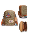 กระเป๋าสะพายข้าง COACH CJ671 STANTON CROSSBODY IN SIGNATURE CANVAS WITH PATCHES (QBE7V)