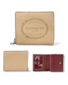 กระเป๋าสตางค์ COACH CM216 SNAP WALLET WITH COACH HERITAGE (SVTP)