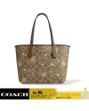 กระเป๋าสะพายไหล่ COACH CN682 MINI CITY TOTE IN SIGNATURE CANVAS WITH STAR AND SNOWFLAKE PRINT (IMWD9)