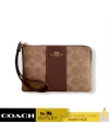 กระเป๋าคล้องมือ COACH CW854 Signature coated canvas and smooth leather (IMXHE)				