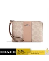 กระเป๋าคล้องมือ COACH CW854 CORNER ZIP WRISTLET IN SIGNATURE CANVAS WITH STRIPE (SVPWH)				
